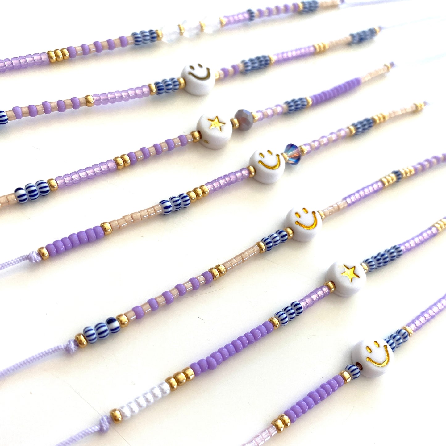 Preciosa Rocailles / blau weiss gestreift 9/0 Ø 2,6mm / 15gr.