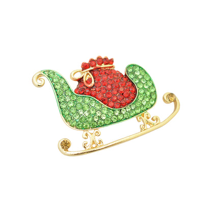 Weihnachtsbrosche Schlitten Strass  / goldfarben / 30x45mm