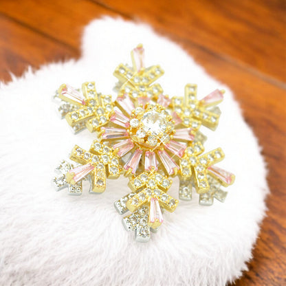 Weihnachtsbrosche Schneeflocke Strass drehbar / goldfarben / 30mm