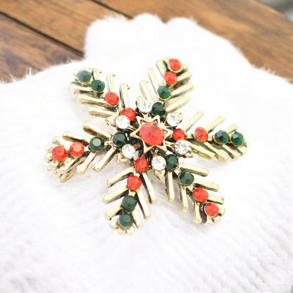 Weihnachtsbrosche Schneeflocke  / goldfarben / 35x35mm