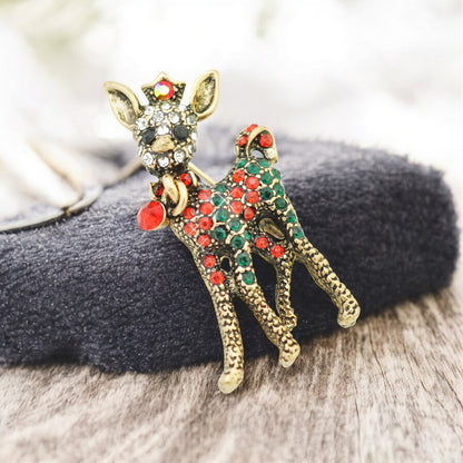 Weihnachtsbrosche Reh Bambi  / messingfarben / 40x20mm