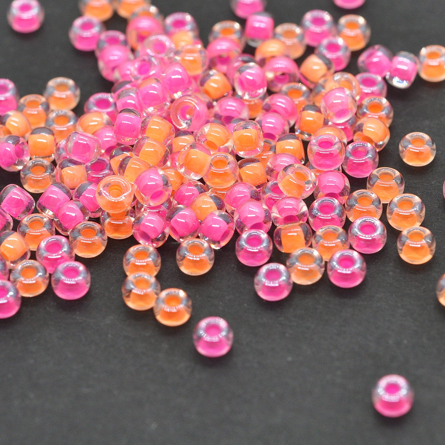 Miyuki Rocailles 8/0 neon orange inside mix / 11gr. Ø 3mm (9902)