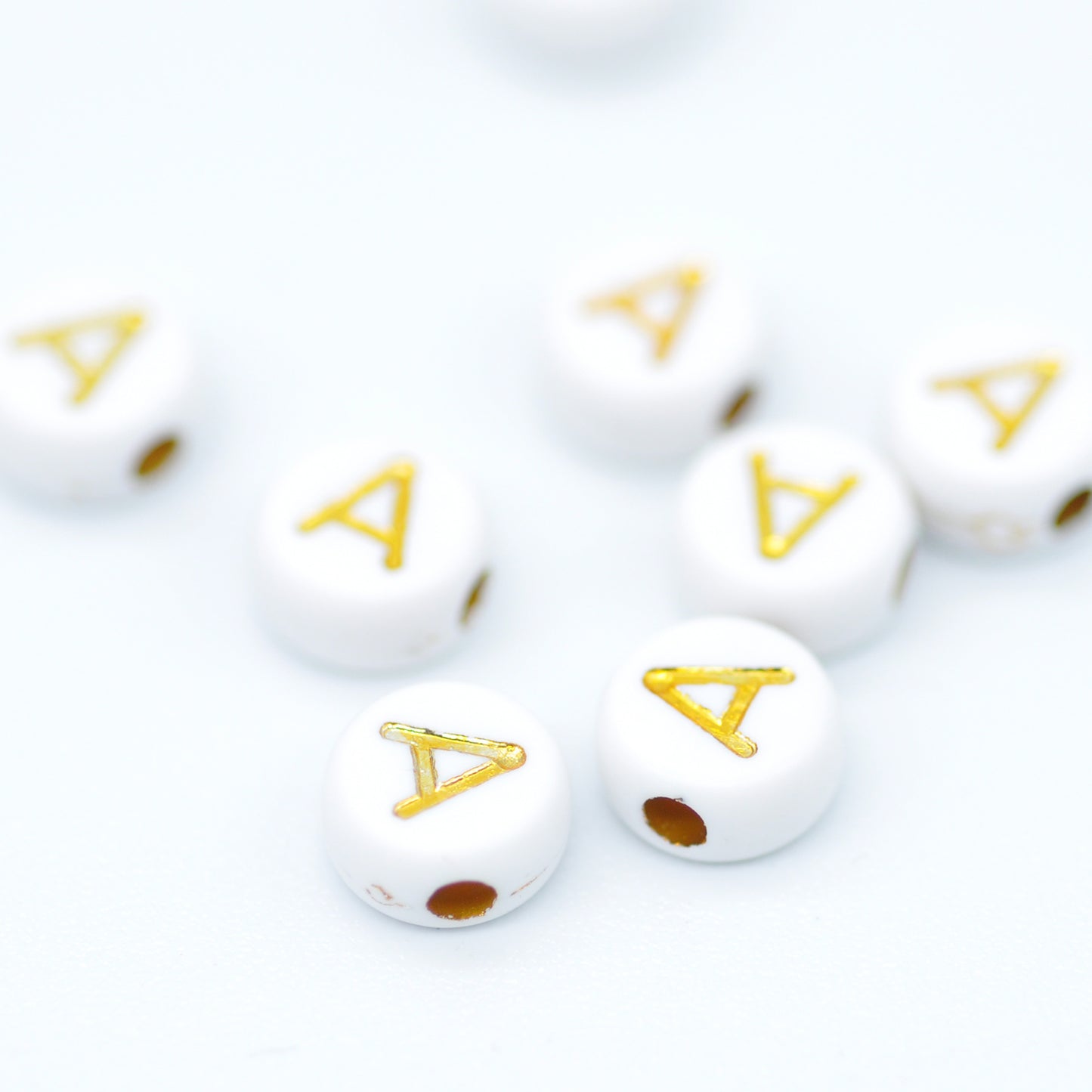 Buchstabe / gold acryl / 6mm